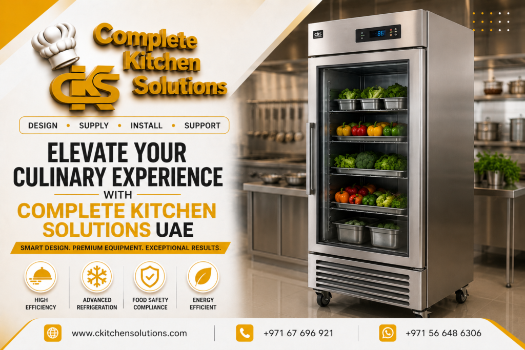 A promotional banner for "Complete Kitchen Solutions" titled "Elevate Your Culinary Experience with Complete Kitchen Solutions UAE," featuring a large stainless steel single-door glass upright commercial refrigerator filled with fresh vegetables in a professional kitchen.