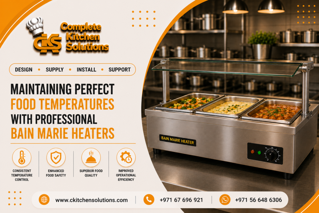 A promotional banner for "Complete Kitchen Solutions" titled "Maintaining Perfect Food Temperatures with Professional Bain Marie Heaters," featuring a stainless steel three-pan commercial countertop bain-marie heater with a glass sneeze guard, displaying hot buffet foods inside a professional kitchen.