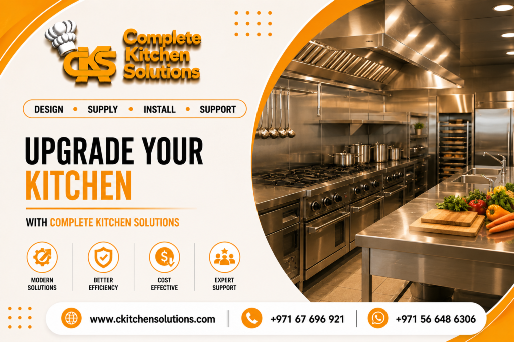 A promotional banner for "Complete Kitchen Solutions" titled "Upgrade Your Kitchen," featuring a state-of-the-art commercial stainless steel kitchen equipped with a heavy-duty gas range line, extraction hoods, and a preparation island with fresh vegetables.
