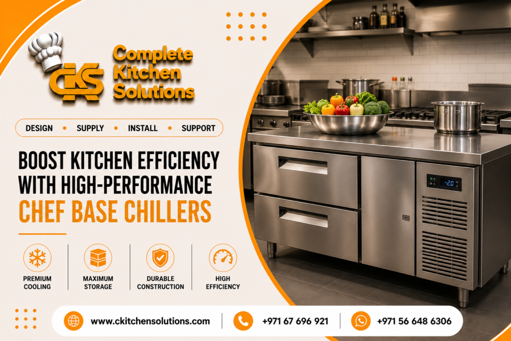 A promotional banner for "Complete Kitchen Solutions" titled "Boost Kitchen Efficiency with High-Performance Chef Base Chillers," featuring a heavy-duty stainless steel commercial undercounter chef base refrigerator displaying a digital temperature reading of -2.0°C, with a large bowl of fresh vegetables resting on its countertop.