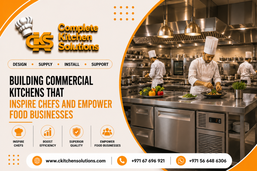 A promotional banner for "Complete Kitchen Solutions" titled "Building Commercial Kitchens That Inspire Chefs and Empower Food Businesses," featuring a professional chef in a tall white hat plating dishes on a stainless steel central island counter while other chefs work at cooking stations in the background.