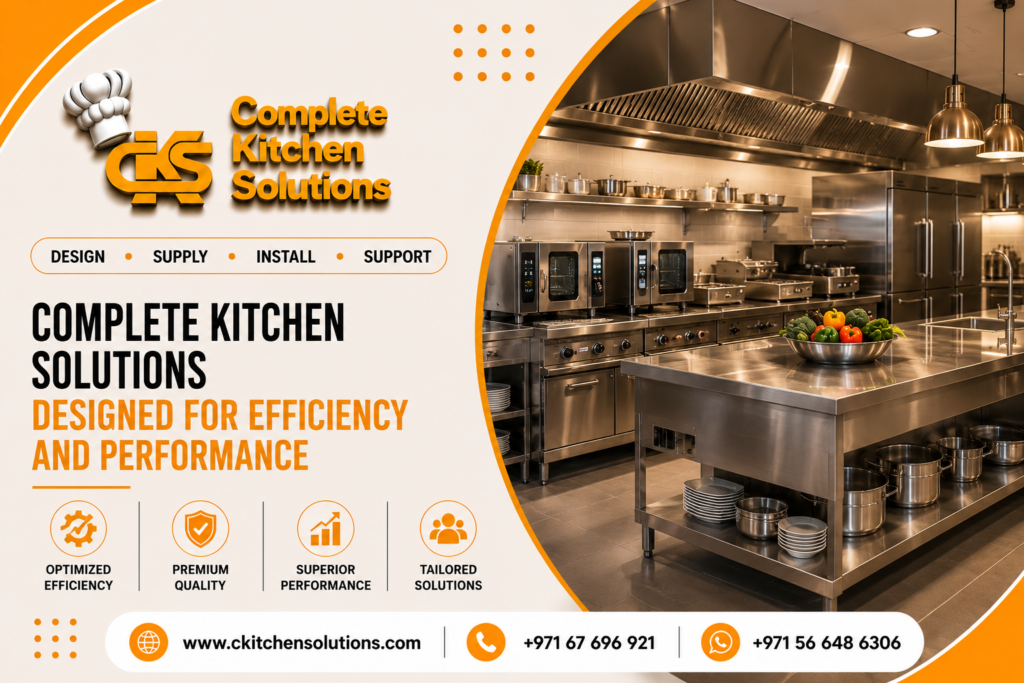 A promotional banner for "Complete Kitchen Solutions" titled "Complete Kitchen Solutions: Designed for Efficiency and Performance," featuring a high-end commercial stainless steel kitchen equipped with a premium cooking line, combi ovens, extraction hoods, and a central preparation island table.