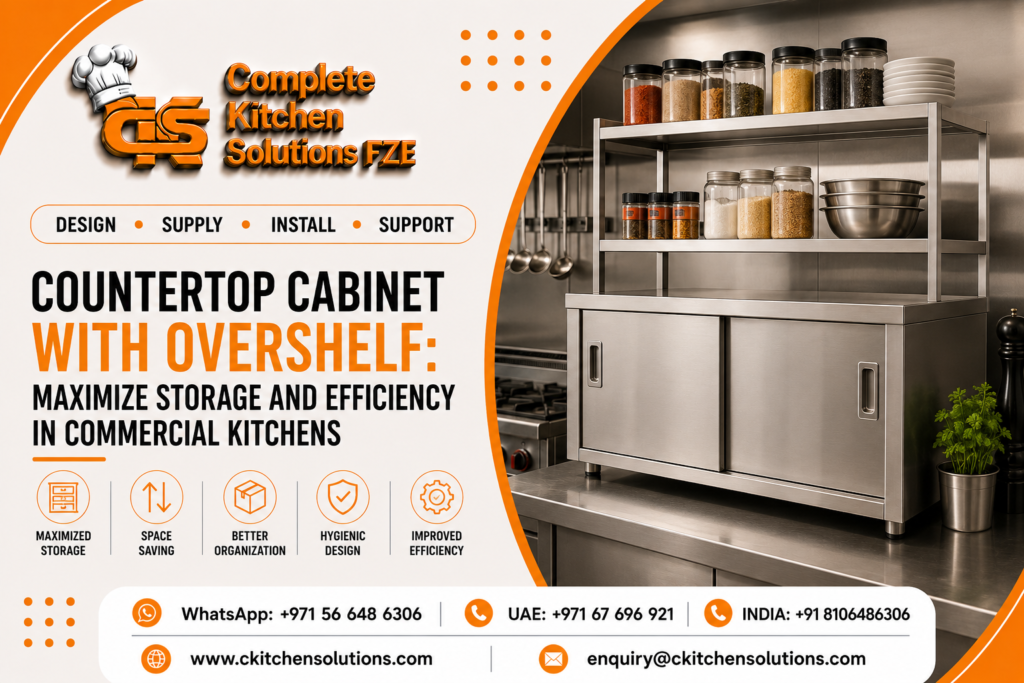 A promotional banner for "Complete Kitchen Solutions FZE" titled "Countertop Cabinet with Overshelf: Maximize Storage and Efficiency in Commercial Kitchens," featuring a stainless steel cabinet with sliding doors and a multi-tier overshelf loaded with spice jars, bowls, and plates on a kitchen worktable.