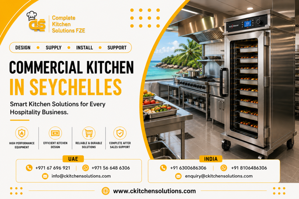 A promotional banner for "Complete Kitchen Solutions FZE" titled "Commercial Kitchen in Seychelles: Smart Kitchen Solutions for Every Hospitality Business," featuring a luxury resort commercial kitchen setup with an Alto-Shaam mobile heated holding cabinet, stainless steel gas ranges, prep tables with fresh produce, and an open scenic tropical beach view in the background.