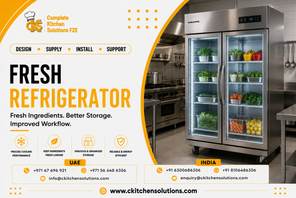 A promotional banner for "Complete Kitchen Solutions FZE" titled "Fresh Refrigerator: Fresh Ingredients. Better Storage. Improved Workflow," featuring a commercial double-glass-door SKOPE upright reach-in refrigerator illuminated with interior LED lights and stocked with fresh vegetables and fruits in a commercial kitchen setting.
