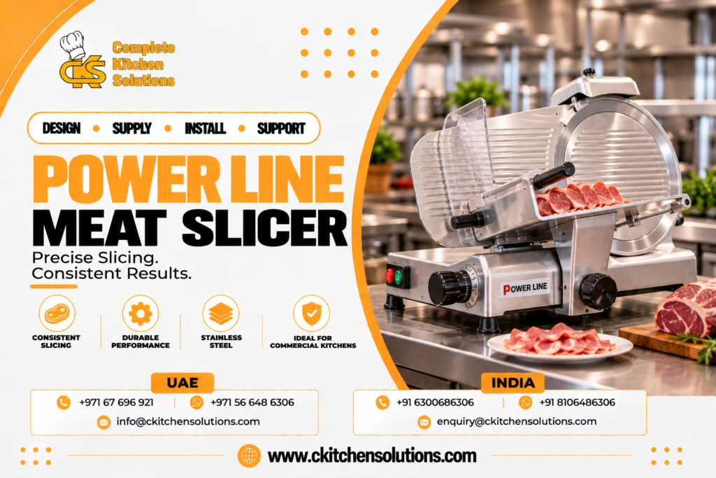 A promotional banner for "Complete Kitchen Solutions" titled "Power Line Meat Slicer: Precise Slicing. Consistent Results," showing a commercial stainless steel Power Line gravity-feed deli meat slicer cutting cured meats, with sliced prosciutto and salami on a stainless steel worktable in an industrial kitchen.